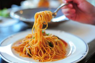 42674339 - spaghetti with tomato sauce close up